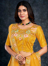 Pleasant Looking Wedding Lehenga Choli in Mustard Yellow Colour